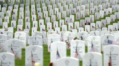 Army says Arlington National Cemetery worker was 'pushed .